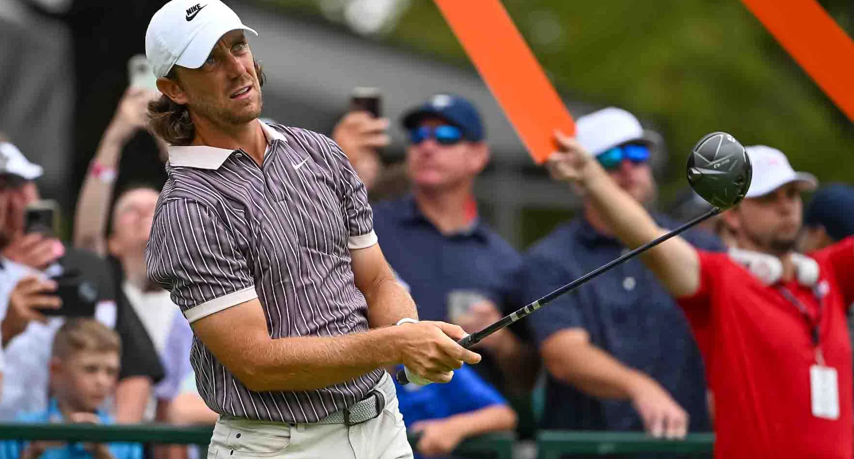 Tommy Fleetwood watches his tee shot at the Tour Championship
