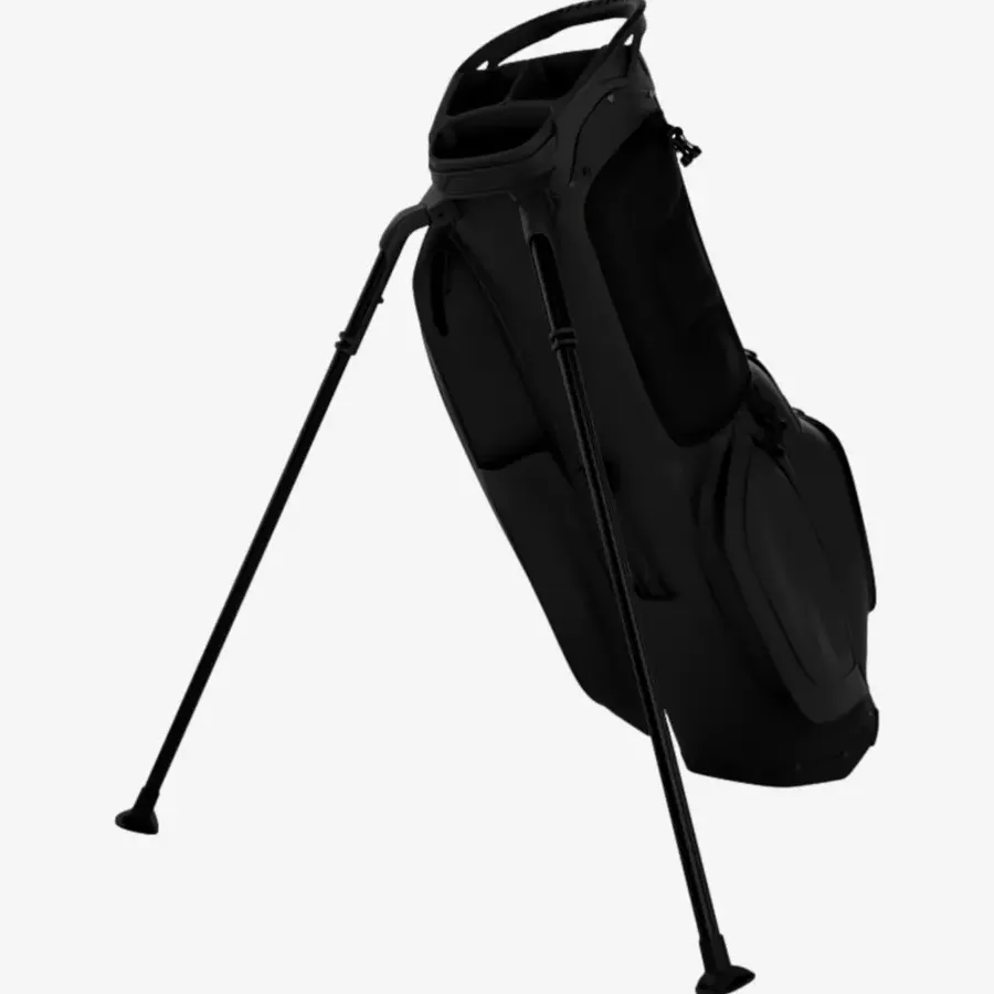 A black golf bag with a stand, featuring two extended legs to keep it upright. Ideal for those seeking the best golf bags 2026, it offers several pockets and a handle at the top. The background is plain white.