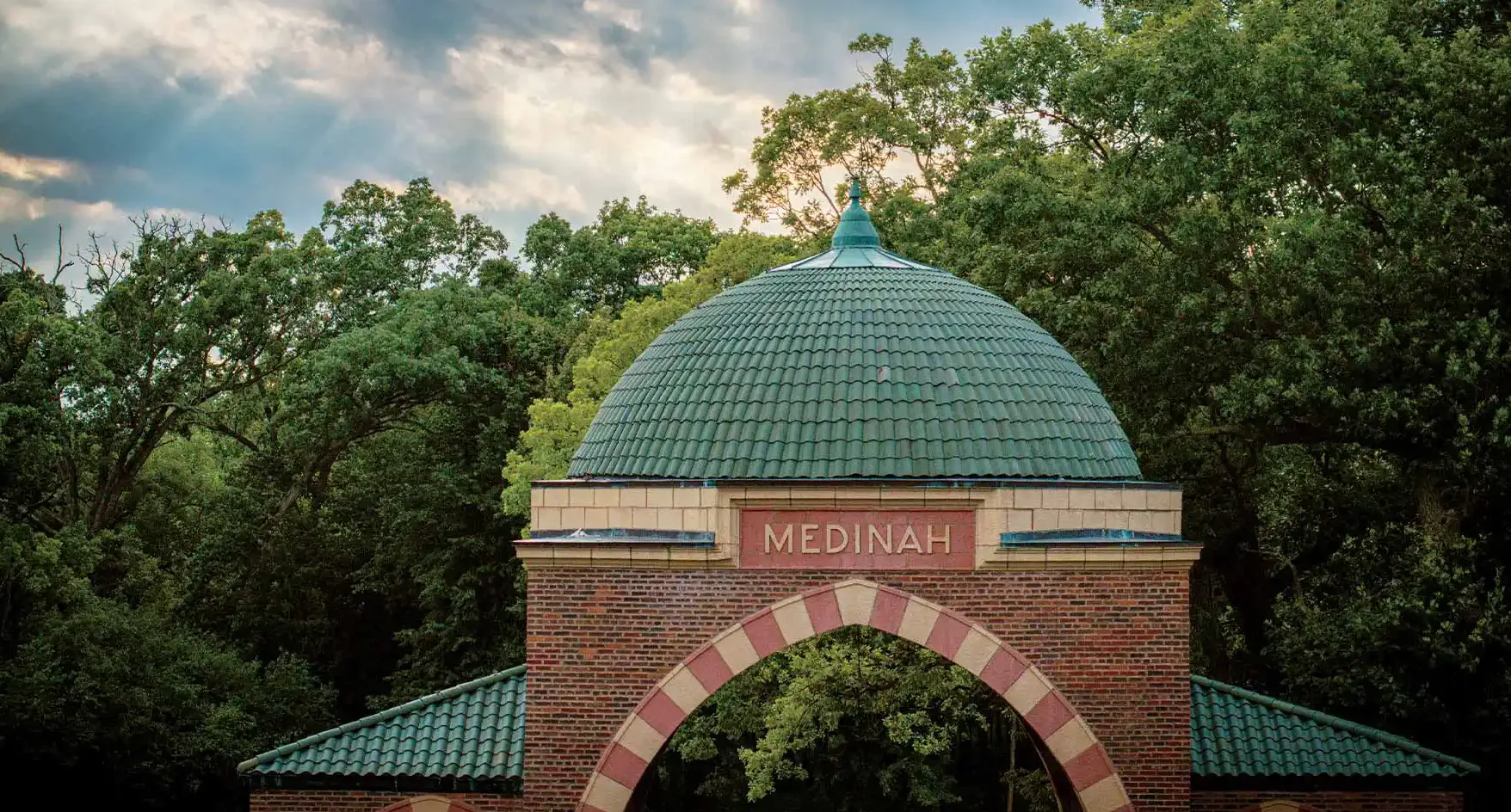 The club's stately entrance sets the tone.